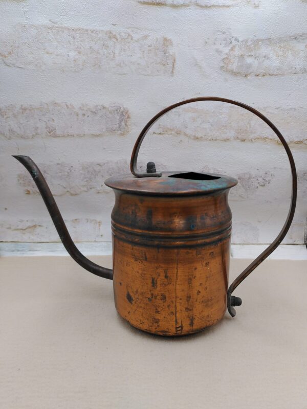Arrosoir de maison en cuivre